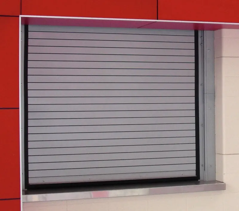 Technician servicing an automatic garage door opener motor